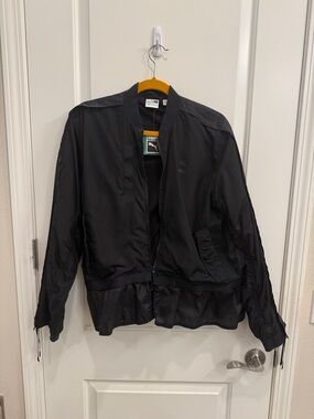 Puma Black Women's Bomber Jacket with Mesh Trim.